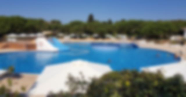 Main pool with water slide, blurred