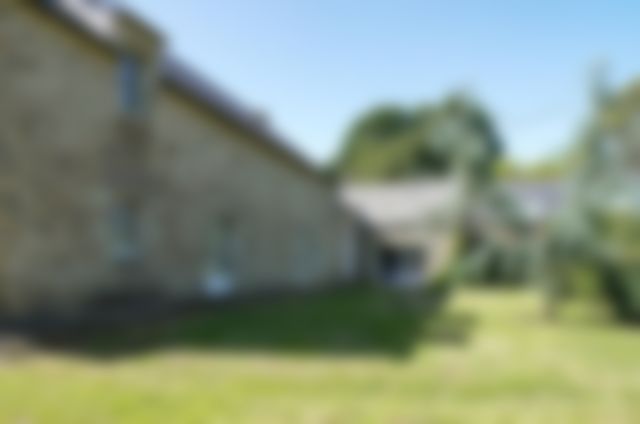 Rear courtyard and stone outbuilding, blurred